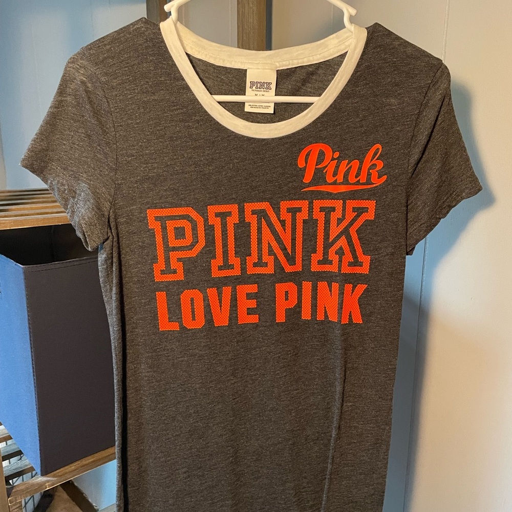 Womens Pink Shirt. Size small. Grey, white, and orange
